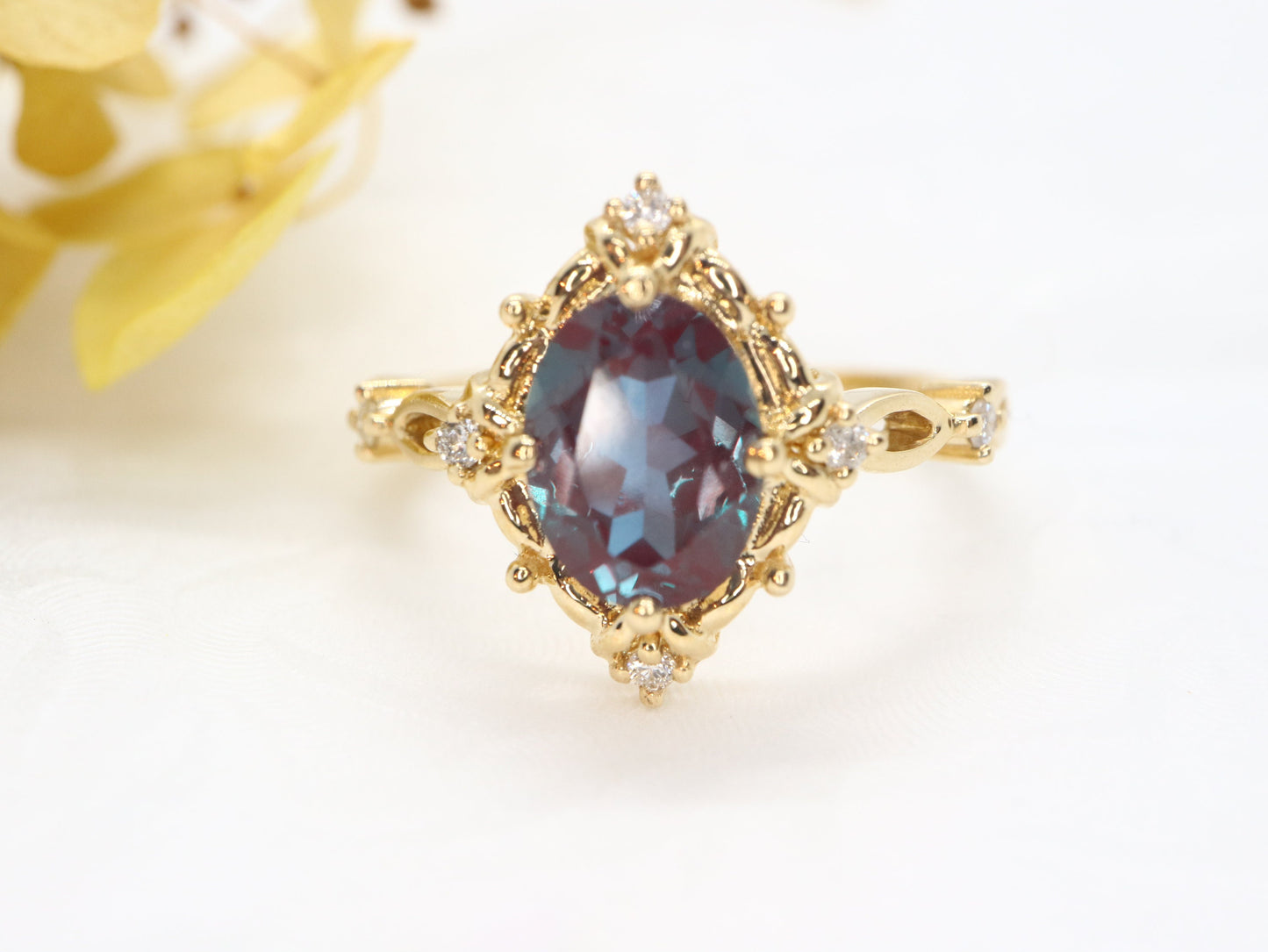 Art Deco Vintage Oval Cut Diamond Engagement Ring in Yellow Gold with Lab Created Alexandrite Accent