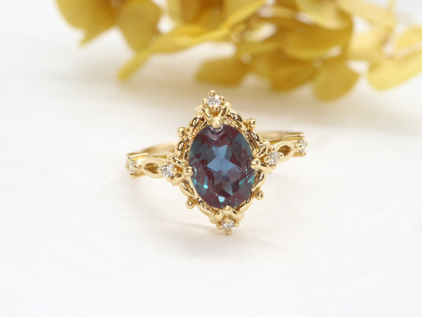 Art Deco Vintage Oval Cut Diamond Engagement Ring in Yellow Gold with Lab Created Alexandrite Accent