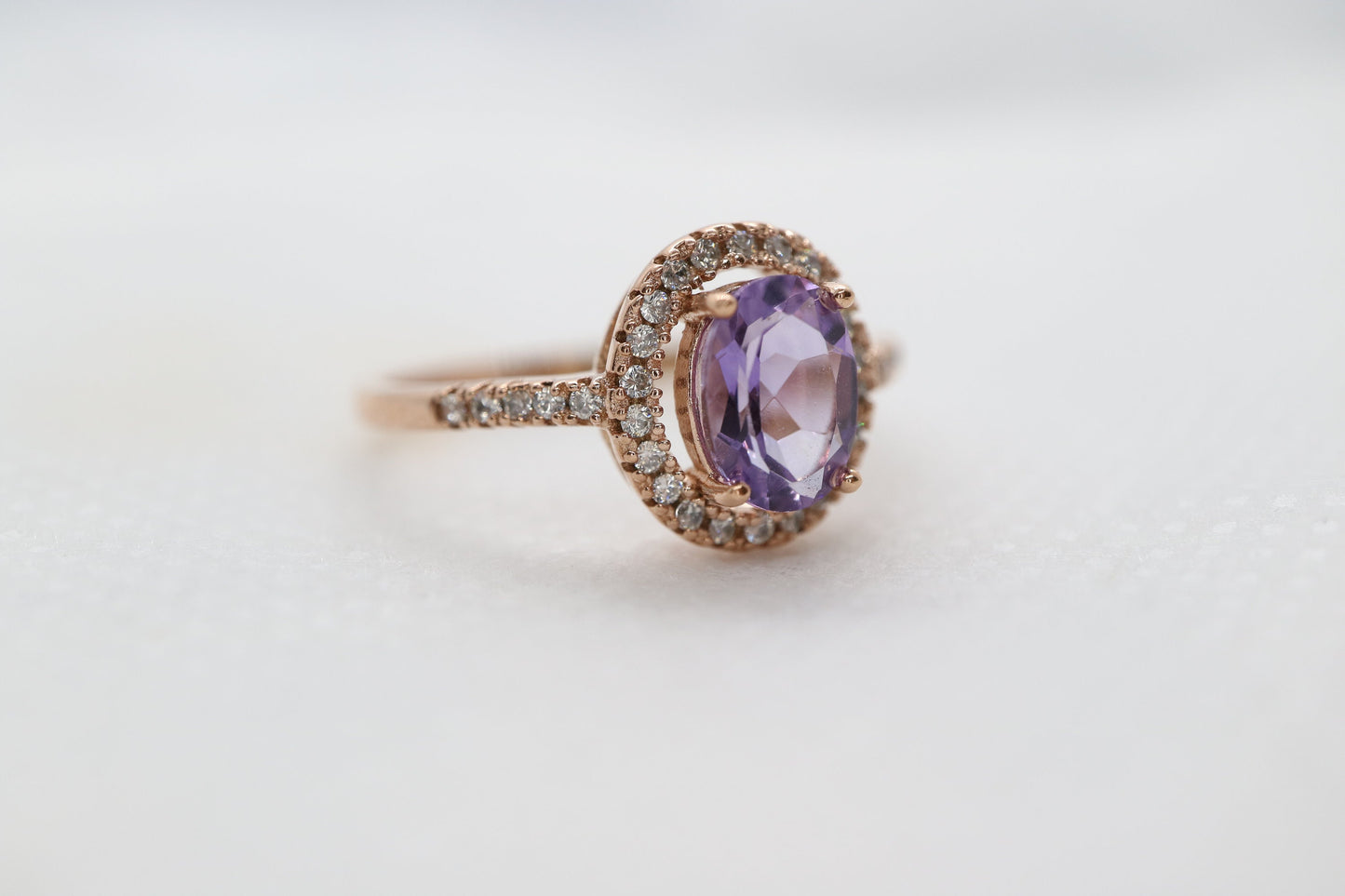 Natural ova cut Tanzanite halo ring set in 18k rose gold, Natural tanzanite ring in rose gold, Sterling silver ring