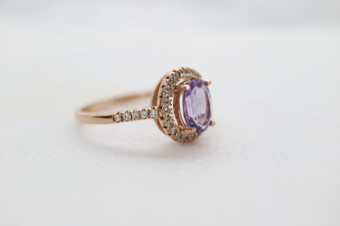 Natural ova cut Tanzanite halo ring set in 18k rose gold, Natural tanzanite ring in rose gold, Sterling silver ring