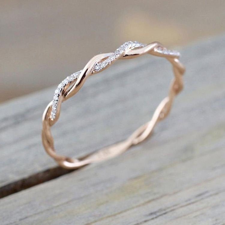 Simple dainty diamond twist rose gold ring