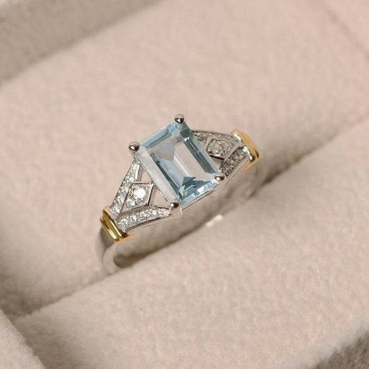 Aquamarine ring, yellow gold, sterling silver, emerald cut gemstone, claw ring