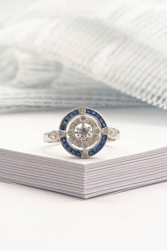 Antique art deco inspired white gold ring with diamond and blue sapphire  halo