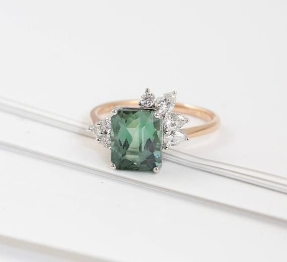 Emerald cut mint Tourmaline with off-set diamond details, Contemporary design ring with custom gemstone in 18k white gold, 18k rose gold.