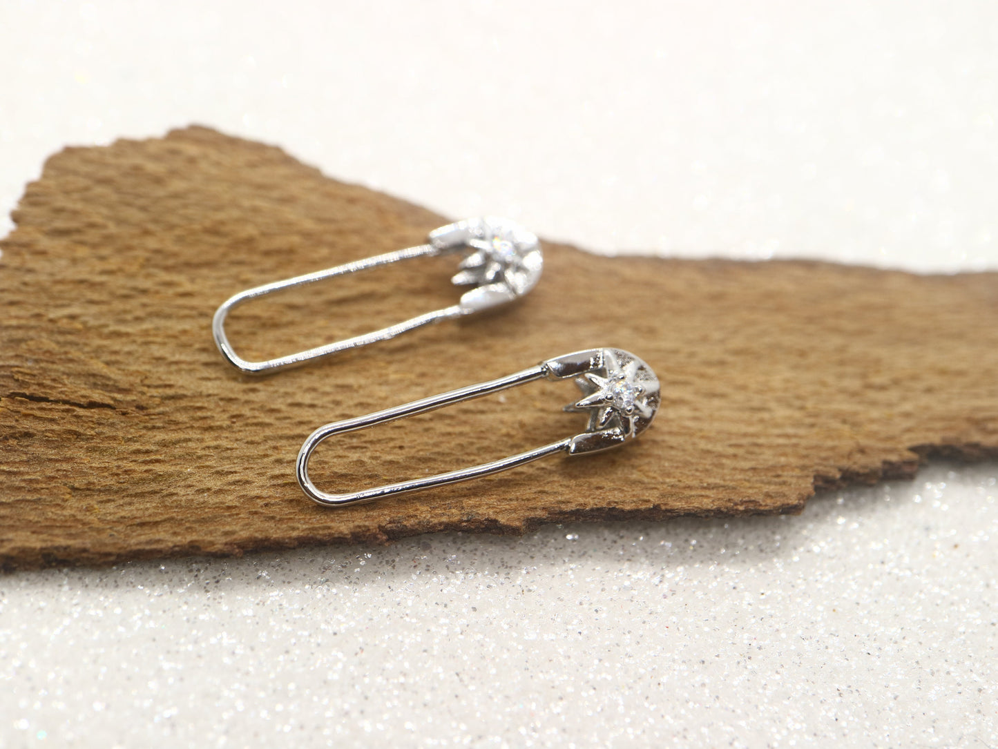 Sterling silver North Star earring, safety pin CZ earring