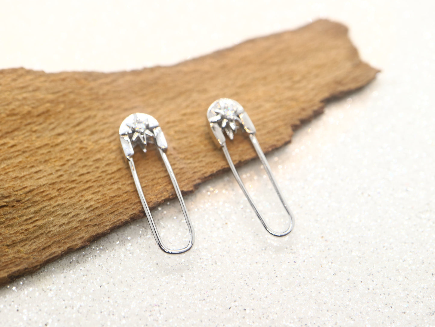 Sterling silver North Star earring, safety pin CZ earring